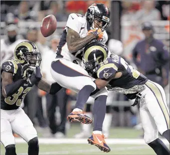  ?? TOM GANNAM / ASSOCIATED PRESS ?? Rams strong safety T. J. McDonald breaks up a pass intended for Broncos wide receiver Andre Caldwell as Rams cornerback E. J. Gaines moves in to help during the fourth quarter Sunday in St. Louis. The Rams won, 22-7.