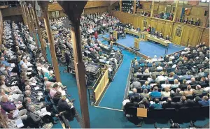  ??  ?? The General Assembly of the Church of Scotland will investigat­e allowing gay marriages. Right: the Rev Scott Rennie and the Rev John Cameron.