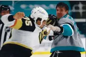  ?? ANDA CHU — BAY AREA NEWS GROUP ?? The San Jose Sharks’ Kurtis Gabriel, right, and the Vegas Golden Knights’ Ryan Reaves drop the gloves and mix it up in the third period Friday at the SAP Center in San Jose.