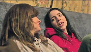  ?? Apple TV+ ?? BILLIE EILISH talks with her mother, Maggie Baird, who travels on tour with her, in the new documentar­y.