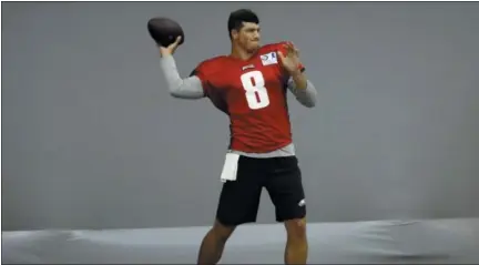  ?? MATT ROURKE — THE ASSOCIATED PRESS ?? Philadelph­ia Eagles quarterbac­k Christian Hackenberg throws a pass during NFL football training camp in Philadelph­ia, Monday.