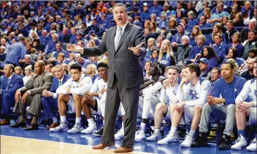  ?? ANDY LYONS / GETTY IMAGES ?? John Calipari presided over Final Four appearance­s with UMass and Memphis, both vacated, and today he coaches Kentucky. The NCAA must shred its rulebook and make the next edition tougher.