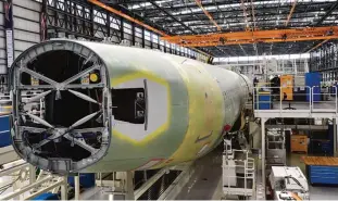  ??  ?? MOBILE: This file photo taken on September 13, 2015 shows the tail end of an Airbus A321 at the Airbus manufactur­ing facility in Mobile, Alabama. —AFP