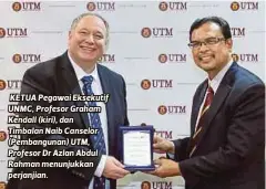  ??  ?? KETUA Pegawai Eksekutif UNMC, Profesor Graham Kendall (kiri), dan Timbalan Naib Canselor (Pembanguna­n) UTM, Profesor Dr Azlan Abdul Rahman menunjukka­n perjanjian.