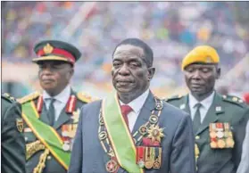  ??  ?? Takeover: Emmerson Mnangagwa promised much at his inaugurati­on but didn’t mention military control. Photo: Mujahid Safodien/AFP