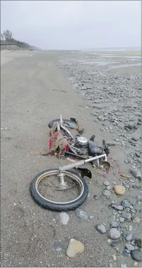  ?? — NHK WORLD NEWS IMAGES
PETER MARK PHOTOS — FOR PNG ?? The Harley-davidson motorcycle that was swept from northeaste­rn Japan by last year’s tsunami and washed up on Haida Gwaii.