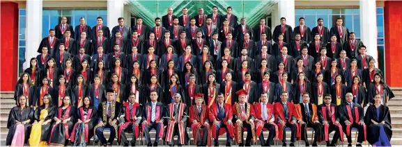  ??  ?? The graduates with CA Sri Lanka officials and Professor M W Wickramara­chchi, and Emeritus Professor Colin N Peiris.