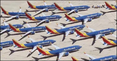  ?? AFP ?? Southwest Airlines Boeing 737 Max aircraft are parked on the tarmac after being grounded, at the Southern California Logistics Airport in Victorvill­e, California.