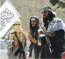  ?? Reuters ?? Taliban fighters in Ghanikhel, Nangarhar, on June 16, during the three-day Eid ceasefire with Afghan forces