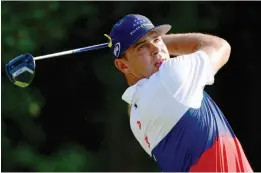  ?? AFP ?? USA’s Gary Woodland plays a shot from the 18th tee in the PGA Championsh­ip first round at Bellerive Country Club on Thursday in St Louis, Missouri. —