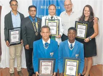  ??  ?? HIGH ACHIEVERS: The Rotary Club of Uitenhage South recognised pupils in its region for outstandin­g achievemen­t in 2017. The pupils include, from left in back row, Keanu Langford, club president Daylan Naidoo, Anja de Beer, Nelson Mandela Bay mayor...