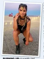  ??  ?? burning up: A scantily clad Chloe at Burning Man festival