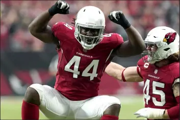  ?? Darryl Webb The Associated Press ?? Arizona linebacker Markus Golden is elated after his sack against Houston in the unbeaten Cardinals’ seventh consecutiv­e victory on Sunday,