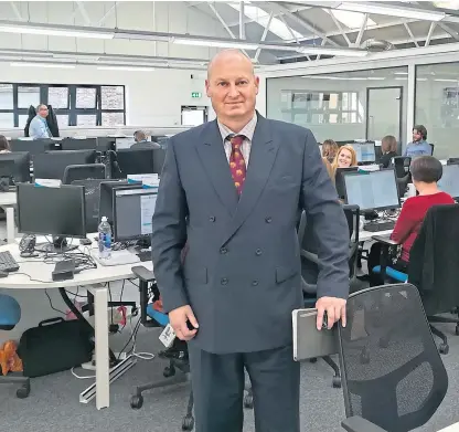  ??  ?? Castle Water chief executive John Reynolds at the firm’s head office in Blairgowri­e.