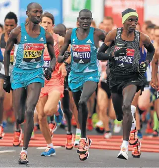  ?? /Getty Images ?? Chasing it down: Kenyans Wilson Kipsang, world record-holder Dennis Kimetto and Eliud Kipchoge, the Olympic champion who has run a 2:00:25 marathon in 2017, have been edging closer to a sub-two hour run for the 42km classic.