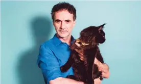  ?? Photograph: Dean Belcher/The Guardian ?? Noel Fitzpatric­k, photograph­ed with his cat, Ricochet.