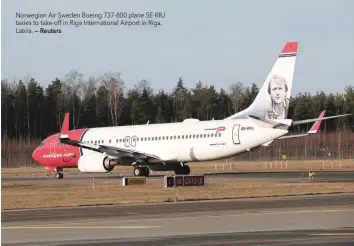  ?? — Reuters ?? Norwegian Air Sweden Boeing 737-800 plane SE-RRJ taxies to take-off in Riga Internatio­nal Airport in Riga, Latvia.