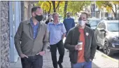  ?? Photos by Matthew Liebenberg/Prairie Post ?? Saskatchew­an NDP leader Ryan Meili (at left) walks with local candidate Stefan Rumpel in downtown Swift Current, Oct. 3.