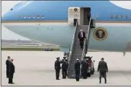  ?? RICK WOOD/MILWAUKEE JOURNAL SENTINEL ?? President Donald Trump is greeted by Col. Daniel Yenchesky, commander of the 128th Air Refueling Wing, in Milwaukee, Wis., on April 18.