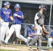  ?? BARRY TAGLIEBER/FOR MEDIANEWS GROUP ?? Roslyn’s Griffin Wittenberg crosses the plate against Perk Valley on Saturday.