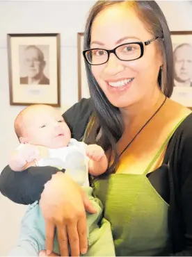  ?? ?? Horowhenua district councillor Piri-Hira Tukapua with newborn baby Cyrus in the council chamber a year ago.