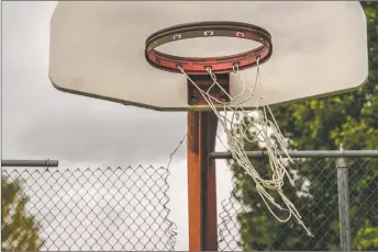  ?? ?? A tattered basketball netting blows in the wind at Fred Baca Park on Tuesday (Oct. 12).