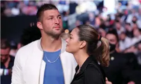  ??  ?? Tim Tebow and wife Demi-Leigh Nel-Peters attend UFC 261 at Jacksonvil­le’s VyStar Veterans Memorial Arena in April. Photograph: Alex Menendez/Getty Images