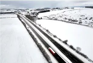  ?? (PA) ?? T he A1 in Northumber­land has been hit by snow
