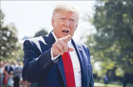  ??  ?? In this Aug 9 photo, President Donald Trump talks to reporters on the South Lawn of the White House in Washington. Trump is showcasing the growing effort to capitalize on western Pennsylvan­ia’s natural gas deposits by turning gas into plastics. (AP)