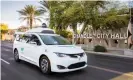  ??  ?? Waymo’s self-driving Chrysler Pacifica hybrid minivan traverses public roads in Chandler, Arizona. Photograph: Waymo