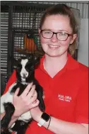  ??  ?? Kate Morris with Patricia the pygmy goat.