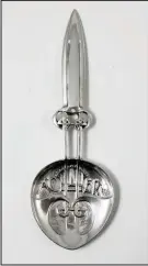  ??  ?? A silver Art Nouveau caddy spoon.