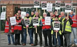  ??  ?? Unhappy: Striking workers at the Coolock plant yesterday