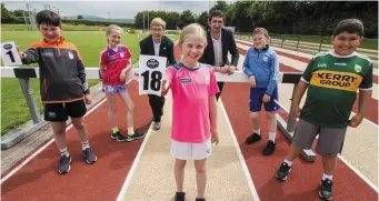  ?? Photo by John Reidy. ?? Seán Daly, Deirdre Moynihan, Margaret Culloty, Kerry Community Games Secretary; Holly Horan, Padraig Mallon, Corporate Affairs, Kerry Group; Mark Curtin and Daniel Kenny sporting the jersey of the sponsors.