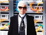  ?? — AFP ?? This file photo shows German fashion designer Karl Lagerfeld at the end of the Chanel 2017 Spring/Summer ready-to-wear collection fashion show in Paris.