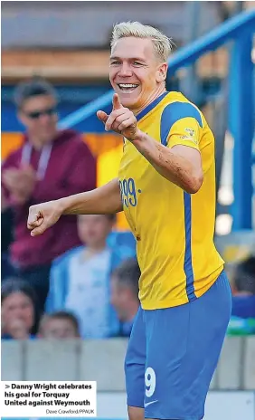  ?? Dave Crawford/PPAUK ?? > Danny Wright celebrates his goal for Torquay United against Weymouth