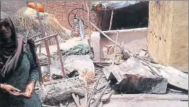  ?? GHULAM JEELANI ?? The strewn grocery, cattle with burn injuries, damaged motorcycle­s, remains of utensils and furniture still lie around in the halfburnt homes in Shabbirpur where clashes took place on May 5.