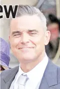  ??  ?? Robbie Williams