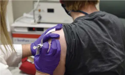  ?? Photograph: AP ?? A patient enrolled in Pfizer’s Covid-19 vaccine clinical trial is treated at the University of Maryland School of Medicine, Baltimore.