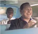  ?? UNIVERSAL PICTURES ?? Tony Lip (Viggo Mortensen, right) introduces Don Shirley (Mahershala Ali) to Kentucky Fried Chicken in “Green Book.”