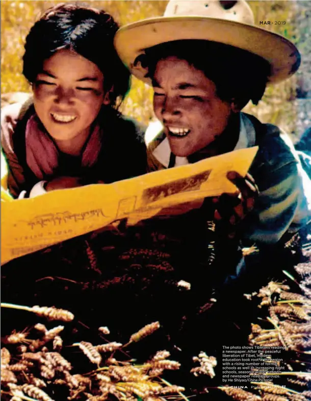  ??  ?? The photo shows Tibetans reading a newspaper. After the peaceful liberation of Tibet, modern education took root in the region with a rising number of formal schools as well as increasing night schools, seasonal winter schools and newspaper reading groups. by He Shiyao/ China Pictorial