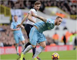  ??  ?? LONDON: Stoke City’s Austrian striker Marko Arnautovic (R) vies with Tottenham Hotspur’s English midfielder Harry Winks (L) during the English Premier League football match between Tottenham Hotspur and Stoke City at White Hart Lane in London,...