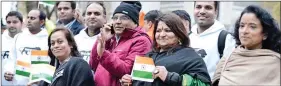  ??  ?? Members of Indian diaspora waiting for PM Narendra Modi to arrive in London last year.