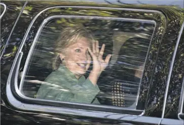  ?? Carolyn Kaster Associated Press ?? HILLARY CLINTON arrives on Tuesday at the home of Justin Timberlake and Jessica Biel for a fundraiser.