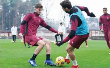  ?? Courtesy: AC Milan FC website ?? AC Milan players attend a training ↑ session on Friday, ahead of their Italian League match against Inter Milan.