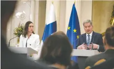  ?? GETTY IMAGES ?? Finland's Prime Minister Sanna Marin, left, and President Sauli Niinistö say they hope to join NATO.