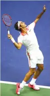  ??  ?? ROGER FEDERER of Switzerlan­d serves to Stan Wawrinka of Switzerlan­d during their Men’s Singles Semifinals match on Day Twelve of the 2015 US Open at the USTA Billie Jean King National Tennis Center on Sept. 11 in the Flushing neighborho­od of the Queens...