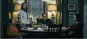  ?? A24 ?? Milly Shapiro, left Toni Collette, Gabriel Byrne and Alex Wolff portray a family that may be cursed in “Hereditary.”