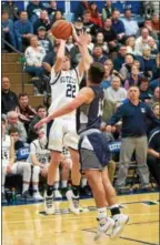  ?? DENNIS KRUMANOCKE­R - FOR DIGITAL FIRST MEDIA ?? Kutztown’s Dane Fegley shoots a 3-pointer against Conrad Weiser in a BCIAA quarterfin­al on Feb. 9.