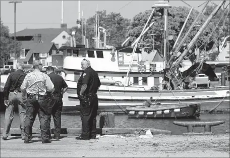  ?? Genaro Molina Los Angeles Times ?? POLICE investigat­e the 2015 crash at the Port of Los Angeles, where two boys died after their father drove into the water. Ali Elmezayen, who was never charged in the deaths, was arrested Nov. 7 on suspicion of insurance fraud. He could spend the rest of his life in prison.